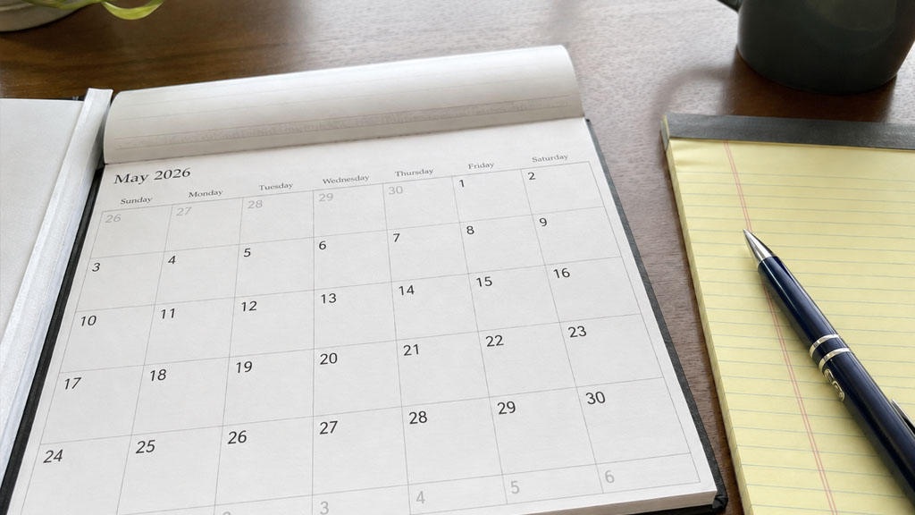 Calendar and legal notepad representing the one-year rule for custody modification in Texas